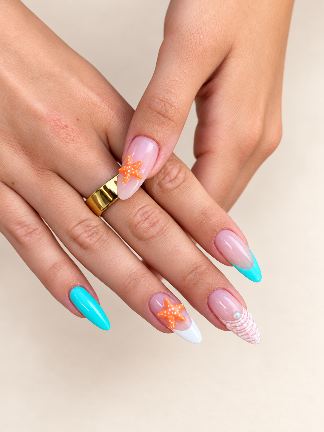 Bright coastal nail art with sculpted starfish details