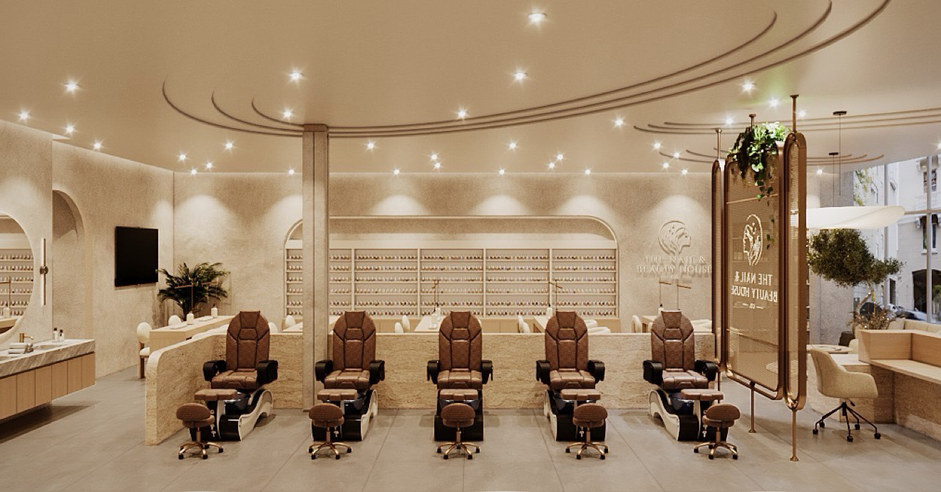 Pedicure chairs and manicure tables in the warm salon interior concept